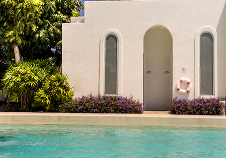 Swimming pool side beauty swimsuit changing room on summer.の写真素材
