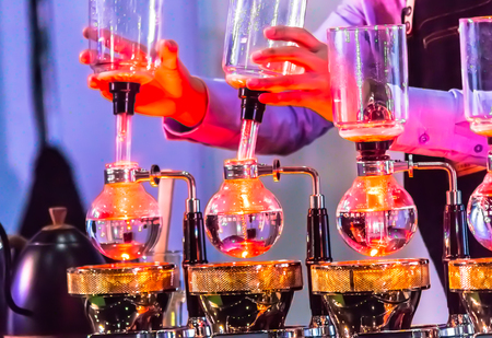 Syphon Coffee or Vacuum Coffee is full immersion tasteful, Blended smell and taste of roasted coffee with direct contact boiled water and show boiling water, stunning vacuum process by Beam heater.の写真素材