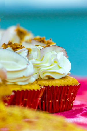 Cupcakes on tier at wedding reception.の写真素材