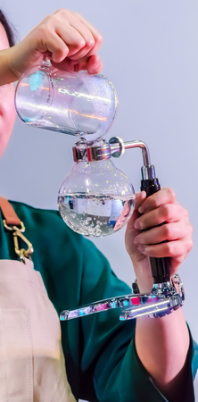 Syphon Coffee or Vacuum Coffee is full immersion tasteful, Blended smell and taste of roasted coffee with direct contact boiled water and show boiling water, stunning vacuum process by Beam heater.の写真素材