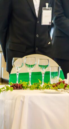 Waiter ready to service at Luxury party dinner in restaurant.の写真素材