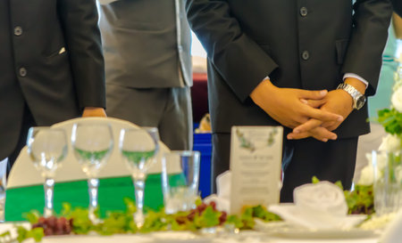Waiter ready to service at Luxury party dinner in restaurant.
