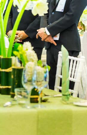 Waiter ready to service at Luxury party dinner in restaurant.の写真素材