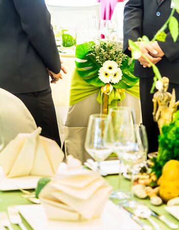 Waiter ready to service at Luxury party dinner in restaurant.の写真素材