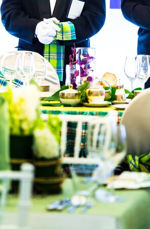 Waiter ready to service at Luxury party dinner in restaurant.の写真素材
