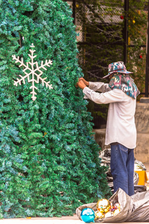 Worker decoration christmas ornament on Christmas tree.の写真素材
