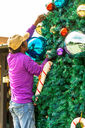Worker decoration christmas ornament on Christmas tree.の写真素材
