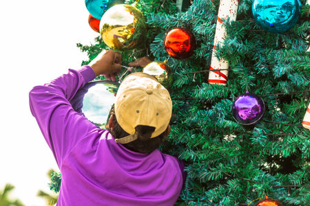 Worker decoration christmas ornament on Christmas tree.の写真素材