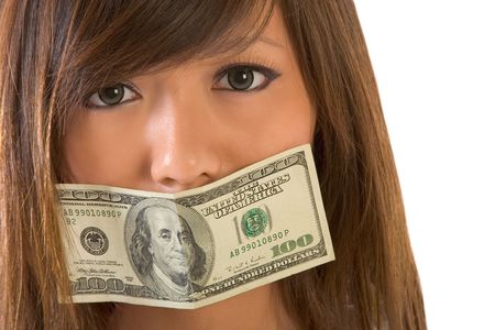Asian girl with mouth gaged by 100 dollar billの写真素材