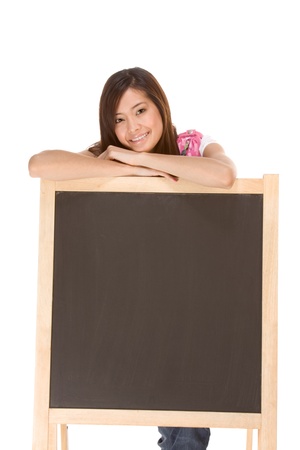 Friendly Asian High school girl student standing with backpackの写真素材