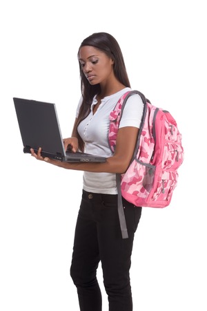 education series template - Friendly ethnic black woman high school student typing on portable computerの写真素材