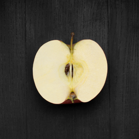 apple on a background of ebonyの写真素材