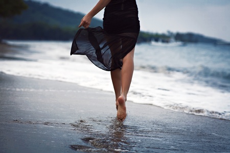 running on beachの写真素材