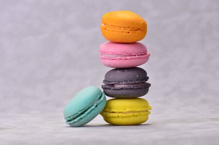 Colorful macarons cakes. Small French cakes. Sweet and colorful french macaroons.の写真素材