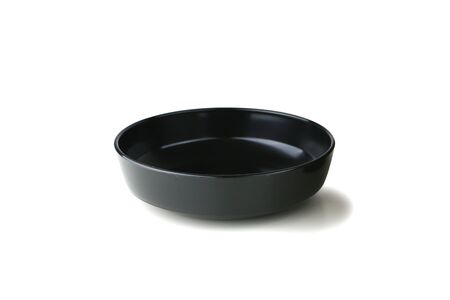 Black plate deep isolated on white backgroundの写真素材