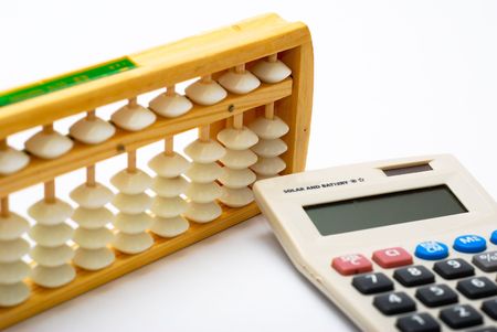 Traditional abacus and modern calculator on white backgroundの写真素材