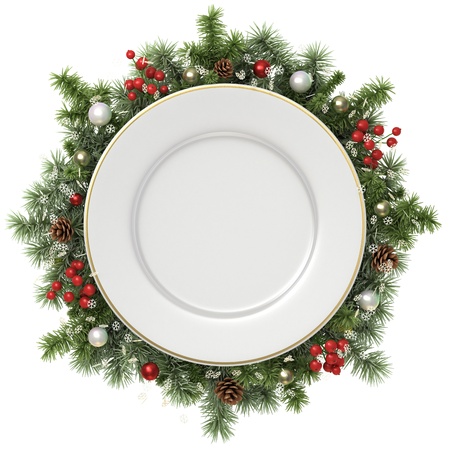 Plate in a Christmas wreath isolated on white.の写真素材