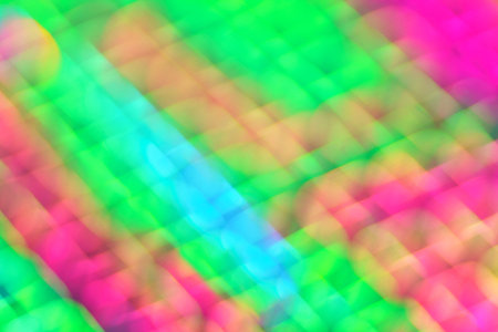 Abstract holographic iridescent gradient color background texture.