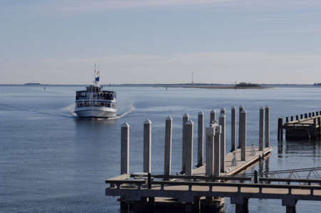Boat returning to dockの写真素材