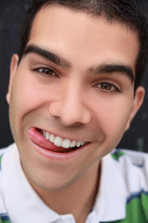 young man making a funny faceの写真素材