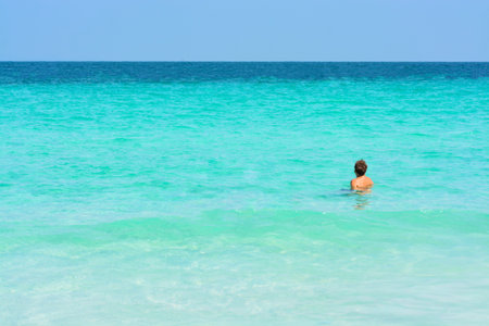 Man swimming in the sea.
