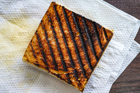Burnt bread from sandwich maker.の写真素材