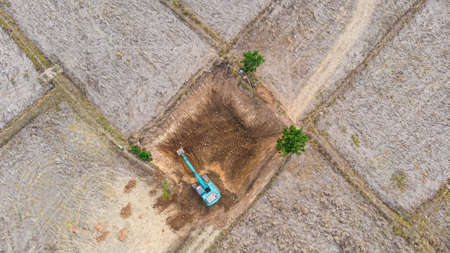 Excavator working on construction site.の写真素材