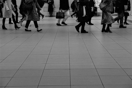 A crowd of people walking.の写真素材