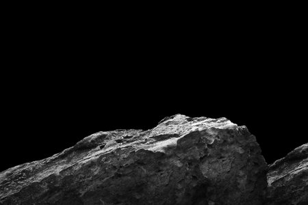 Stone podium on dark black background.