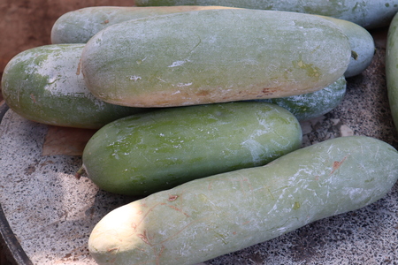 There are a lot of gourd on the marble tableの写真素材