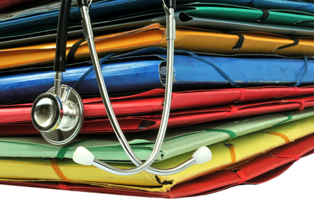 Medical records with a stethoscopeの写真素材