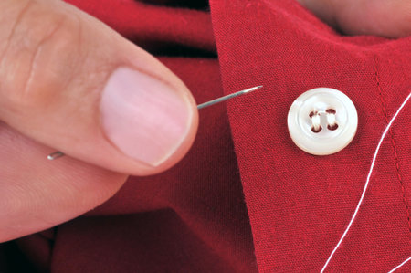 Sew up a shirt button