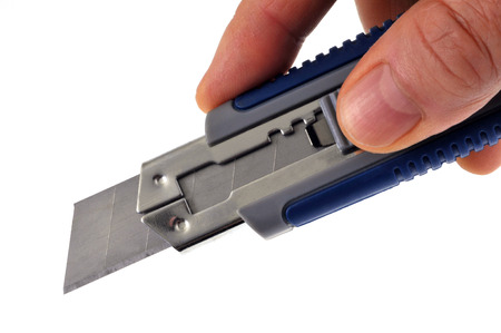 Cutter in handの写真素材