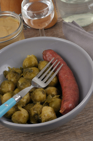 Brussels sprouts with a smoked sausageの写真素材