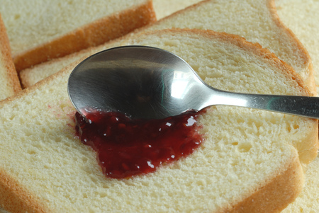 Strawberry jam on sandwich breadの写真素材