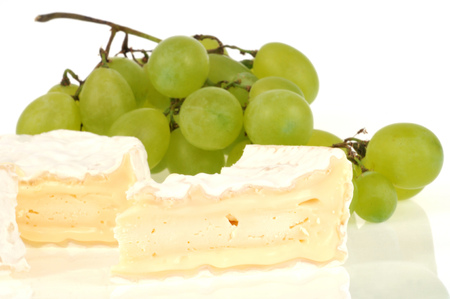 Camembert and bunch of grapesの写真素材