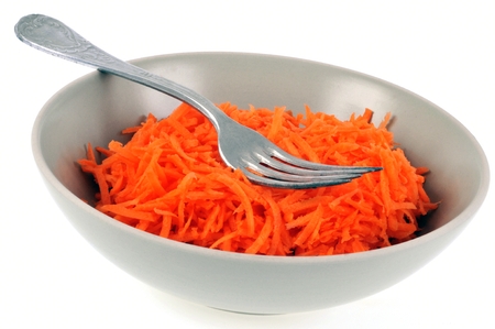 Plate of grated carrotsの写真素材