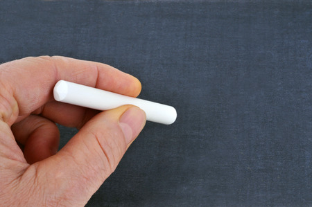 Chalk in a handの写真素材