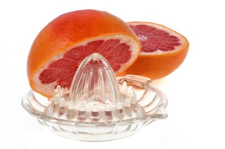 Juicer and pink grapefruitの写真素材