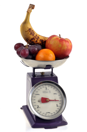 Weighing fruitsの写真素材