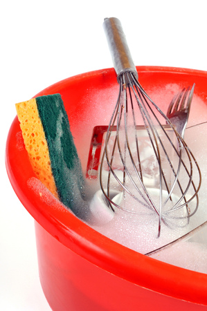 Dishes in a basinの写真素材