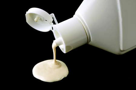 Pour a maintenance product on a black backgroundの写真素材