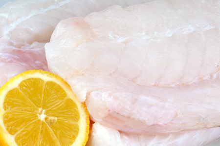 Cod and slice of lemonの写真素材