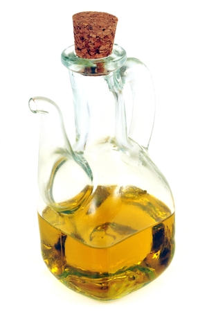 Carafe of olive oil on a white backgroundの写真素材