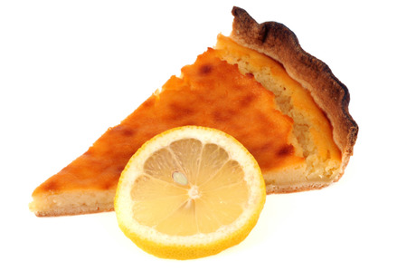 Part of lemon pie on white backgroundの写真素材