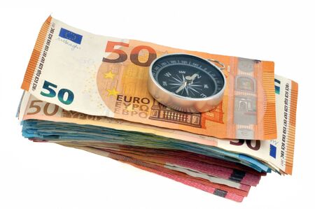 Bundle of Euro banknotes with a compassの写真素材