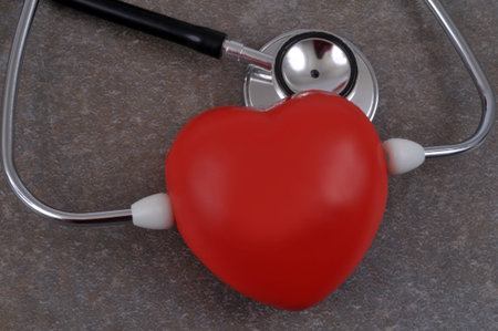 Cardiology concept with a stethoscope and a heart