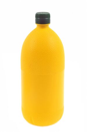 Yellow plastic bottle close up on white backgroundの写真素材