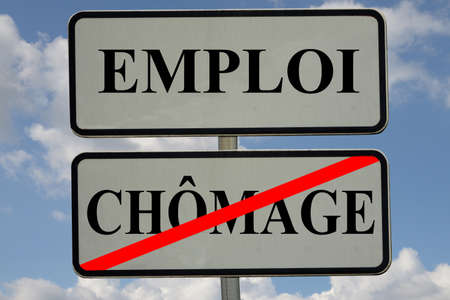 Sign with the words Job and Unemployment crossed outの写真素材