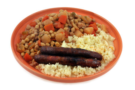 Couscous served in a dish close-up on white backgroundの写真素材